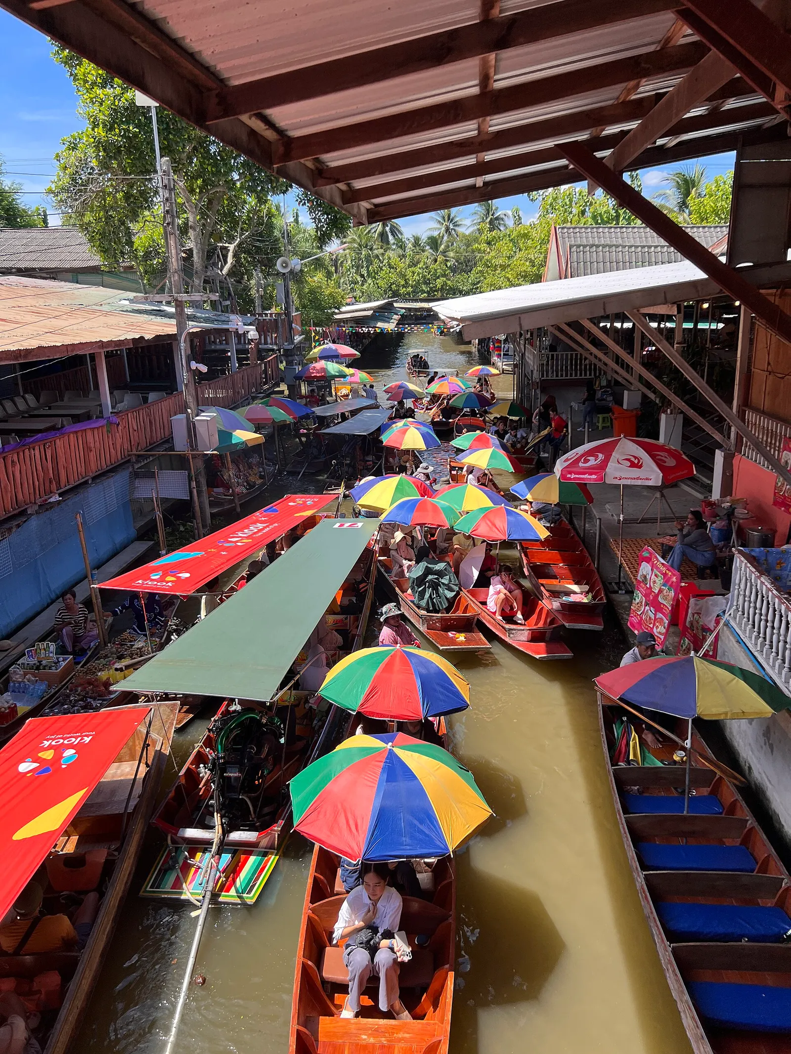 Boats loaded with fruit and produce at a floating market near Bangkok, Thailand