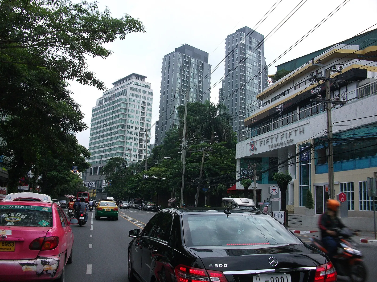 A leafy side street off Sukhumvit in Bangkok, Thailand, during the day