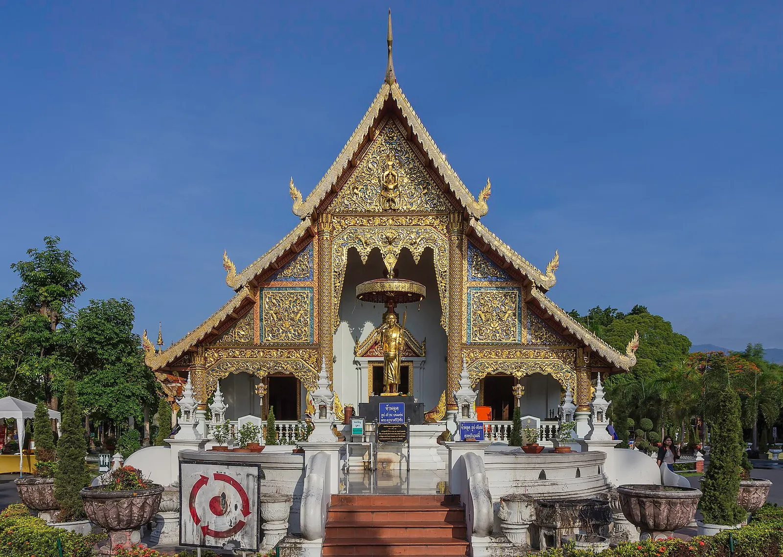 The golden Doi Suthep temple on a forested mountainside above Chiang Mai, northern Thailand