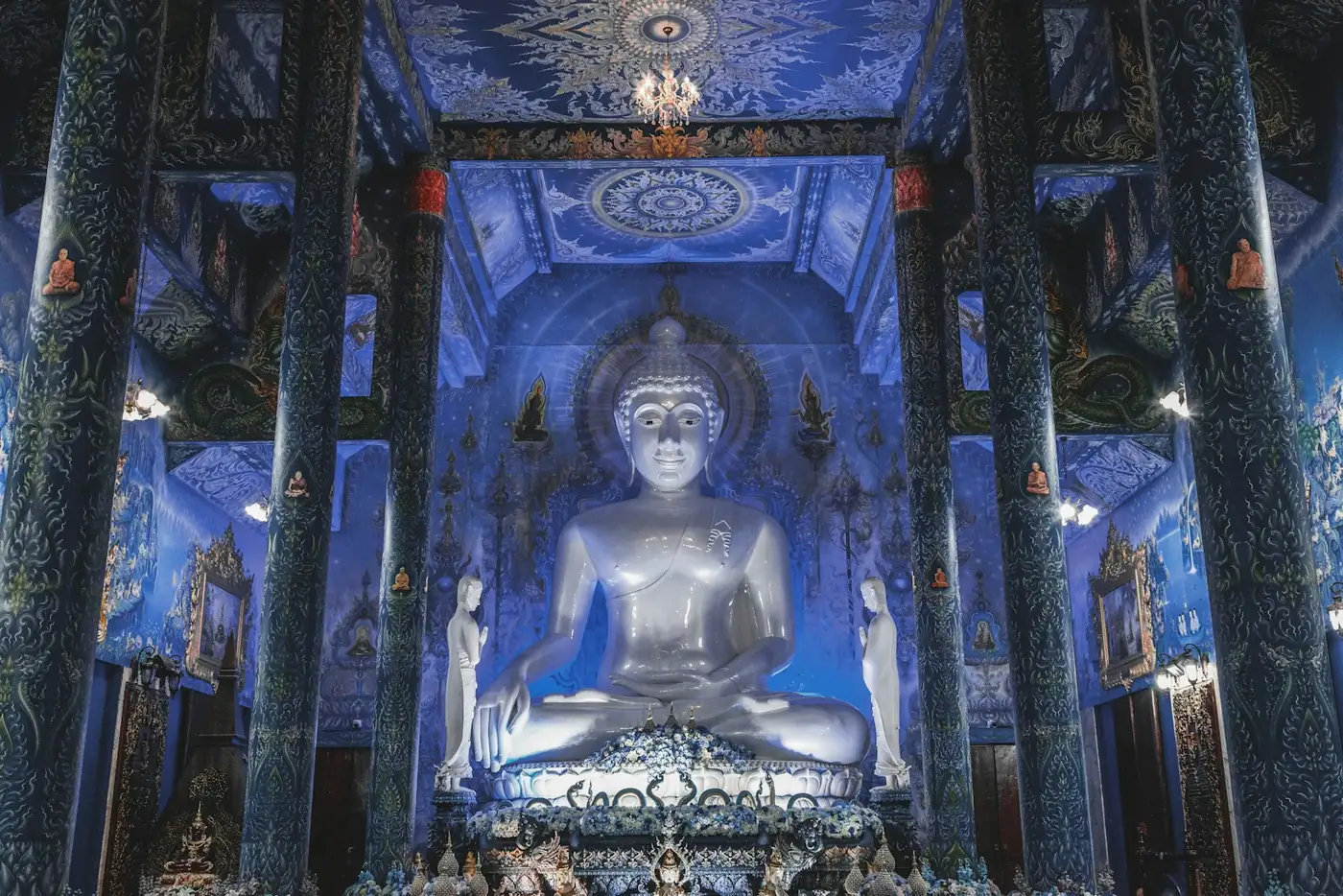 The blue and gold temple hall at Chiang Rai, Thailand
