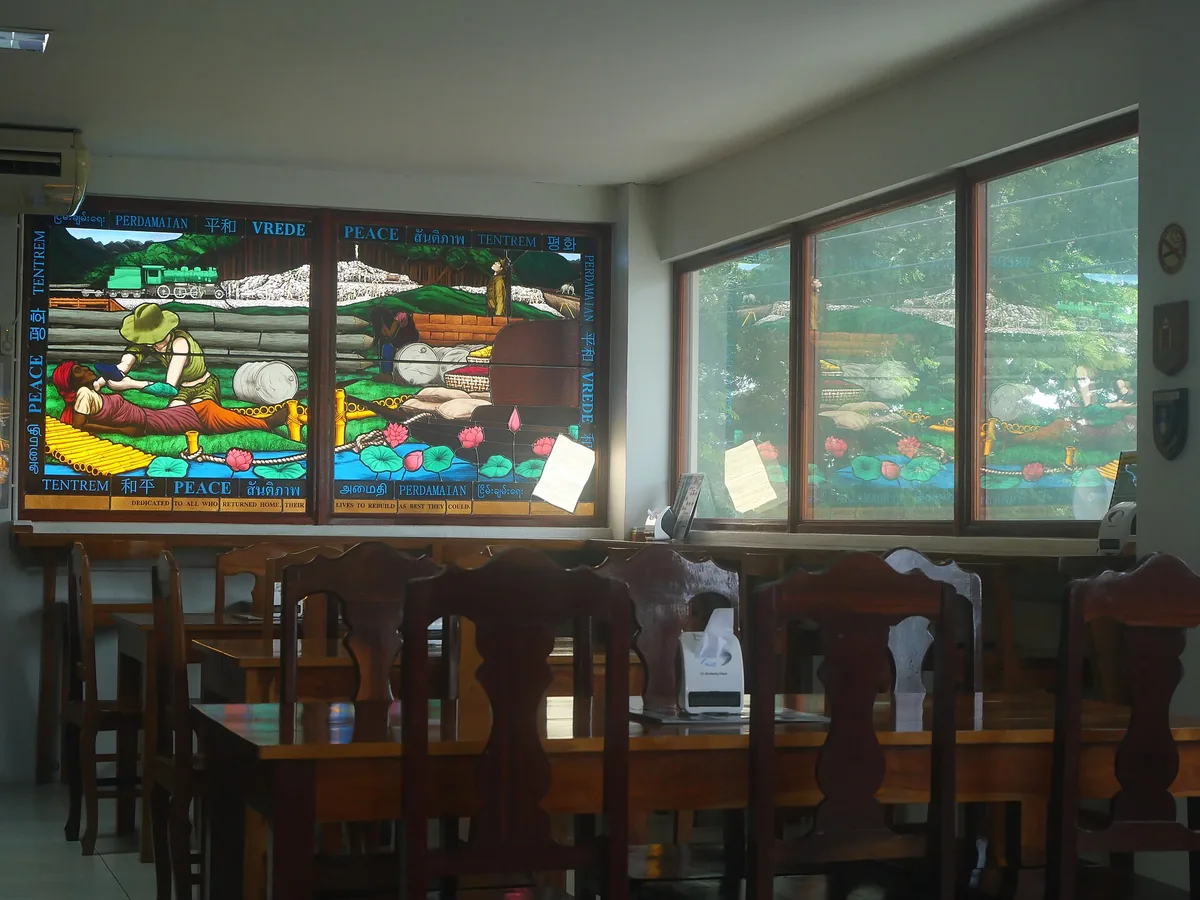 A mosaic display and windows in the hall of the Thailand Burma Railway Centre in Kanchanaburi