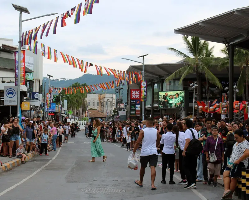 The Central Festival Samui mall frontage on Chaweng Beach Road, with shopfronts and a crowd in the street