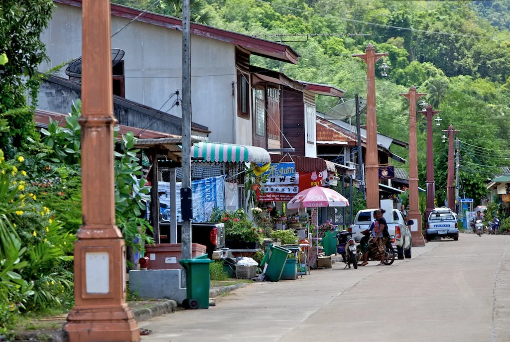 The old town street on Koh Lanta, timber houses on stilts along both sides