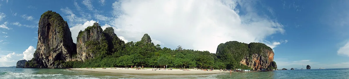 Phra Nang beach in Krabi, limestone cliffs and jungle above the sand