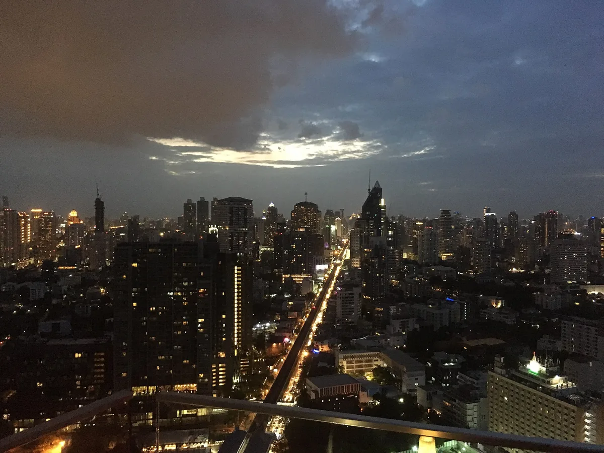 Bangkok at night from the Octave roof, street lights running to the horizon
