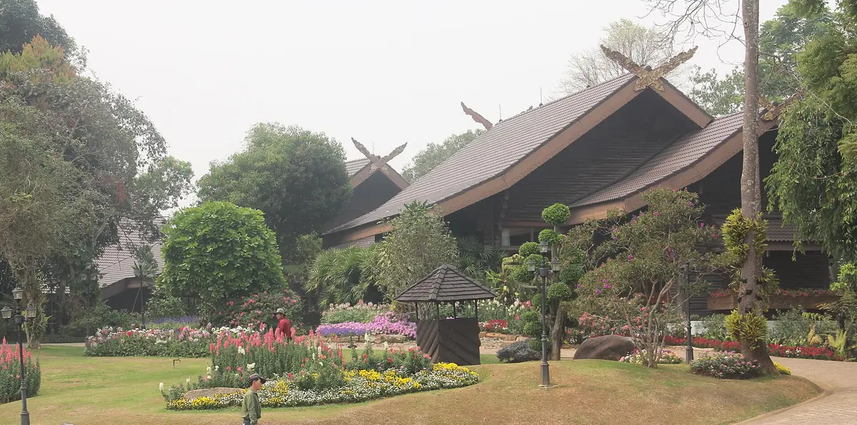 The timber Doi Tung Royal Villa surrounded by gardens