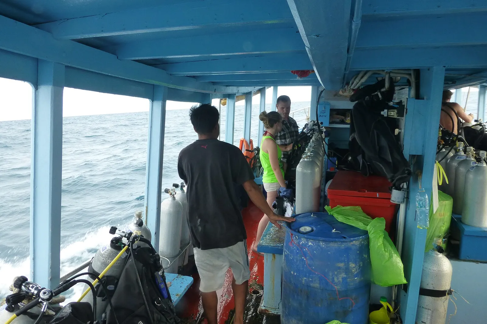 Diving boat moored in clear turquoise water off Koh Tao, Thailand